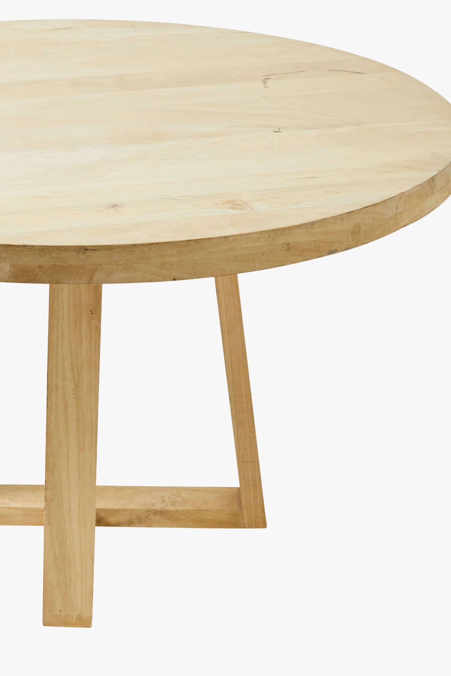 Mesa de comedor circular con acabado rubio suave