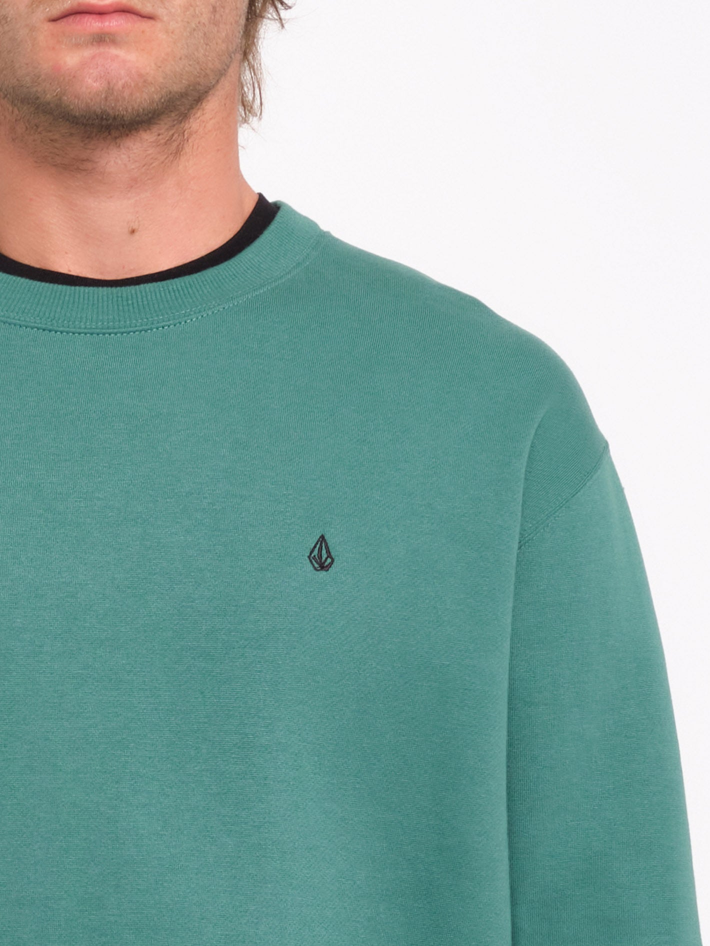 Chaqueta deportiva unisex Piedra Única - Verde oceánico con diseño minimalista